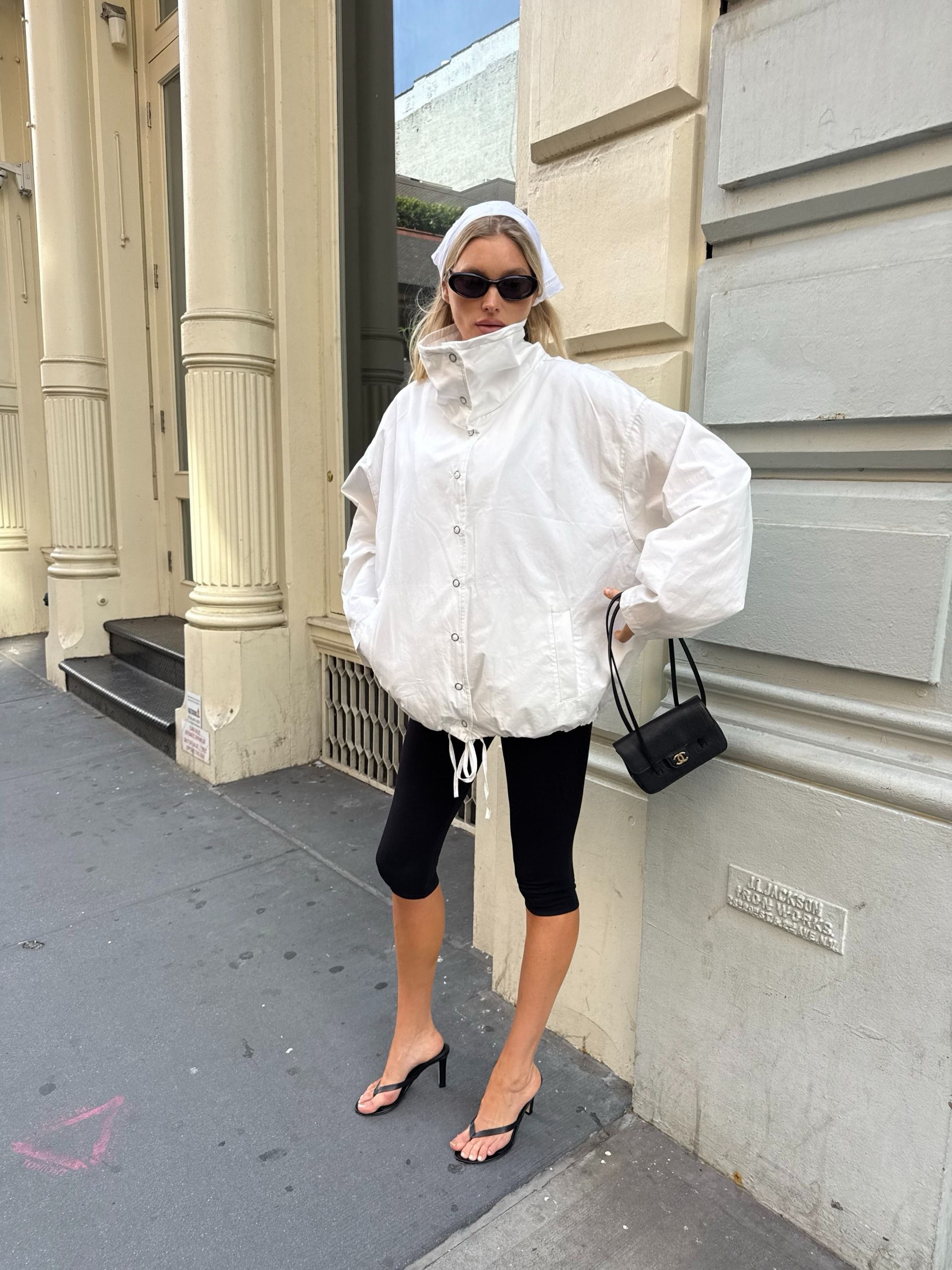 Woman wearing black capris.