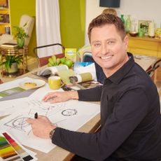 george clarke drawing at table