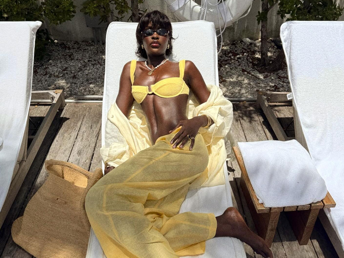 @lefevrediary lounging in pool chair in Monday Swim brand yellow bikini and pants set