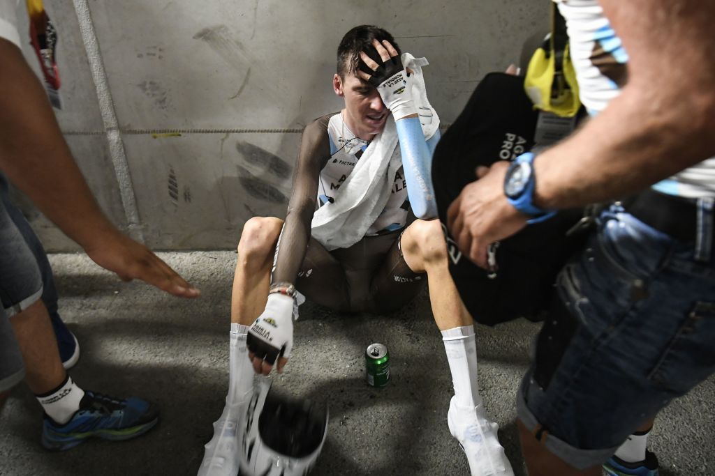 An exhausted and emotional Romain Bardet after stage 20 of the Tour de France