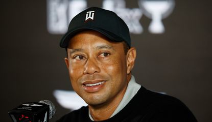 Woods speaks at a press conference