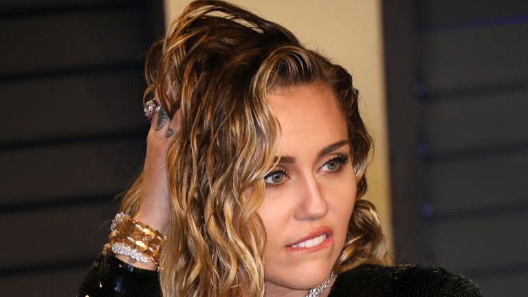 Hair, Face, Blond, Beauty, Eyebrow, Lip, Hairstyle, Nose, Model, Long hair,