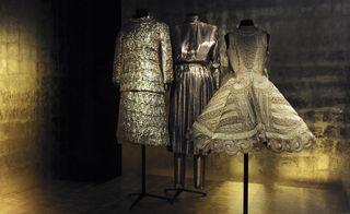 In the 'Gold' room, from the left: a Chanel boucle suit from 1967
