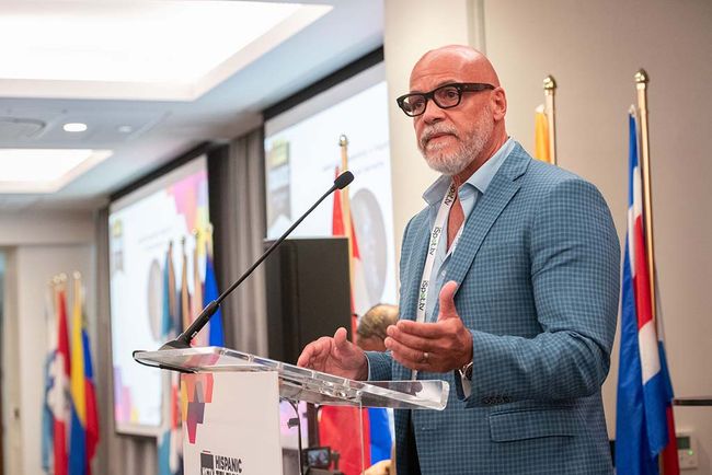 Tony Hernandez of the Immigrant Archive Project and Latino Broadcasting, accepts the Award for Leadership in Hispanic TV for Cultural Narrative.