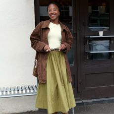 @taffymsipa wears Free People's Lowen Midi Skirt in 'Cardamom Seed'