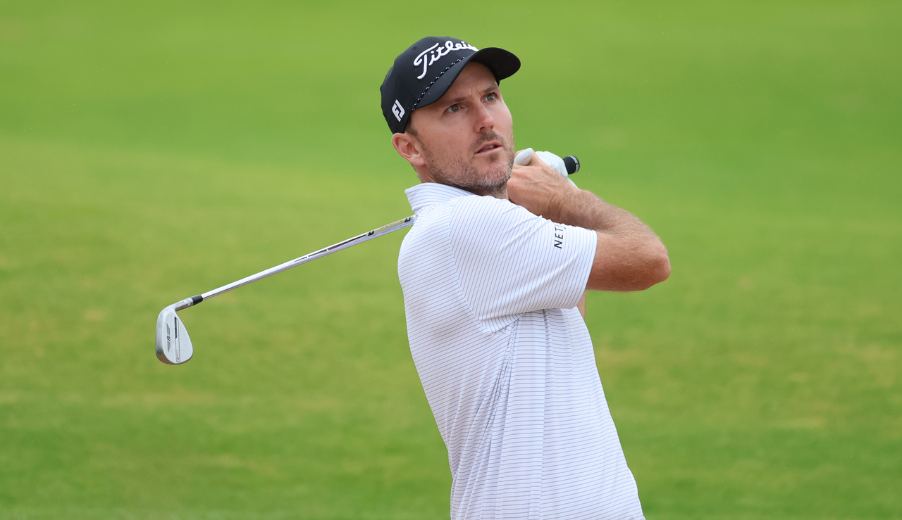 Russell Henley hits a wedge shot
