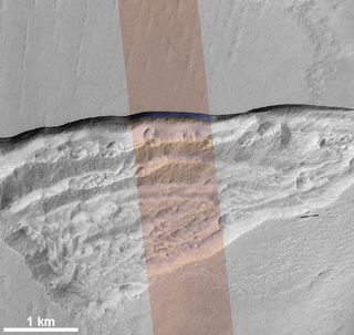 This high-resolution HiRISE image shows an icy scarp on Mars in the context of a broader area. 