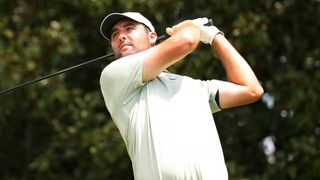 Scottie Scheffler takes a tee shot at the Tour Championship