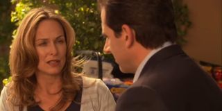 Michael and Jan talking in the supermarket parking lot on The Office