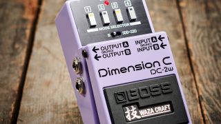 A Boss DC-2W Dimension C chorus pedal on a wooden floor