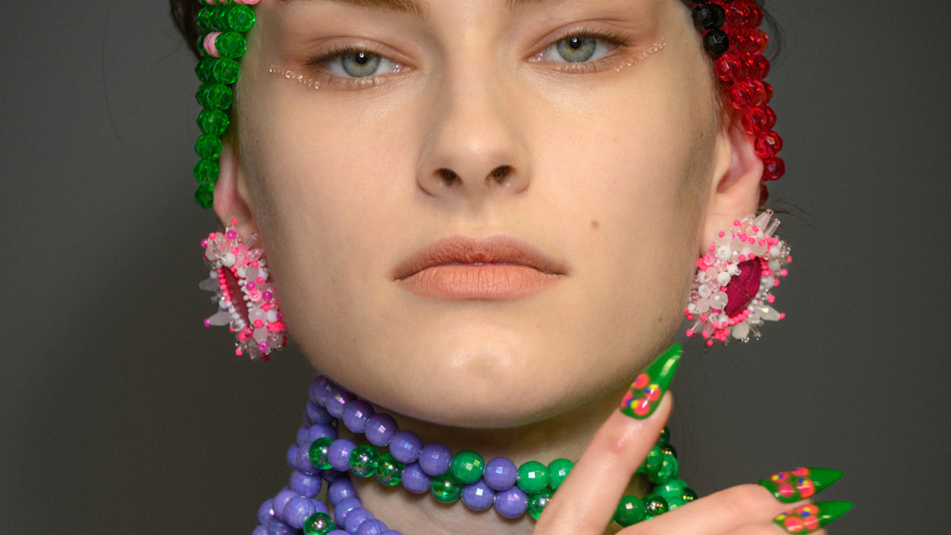 Model with almond-shaped nails.