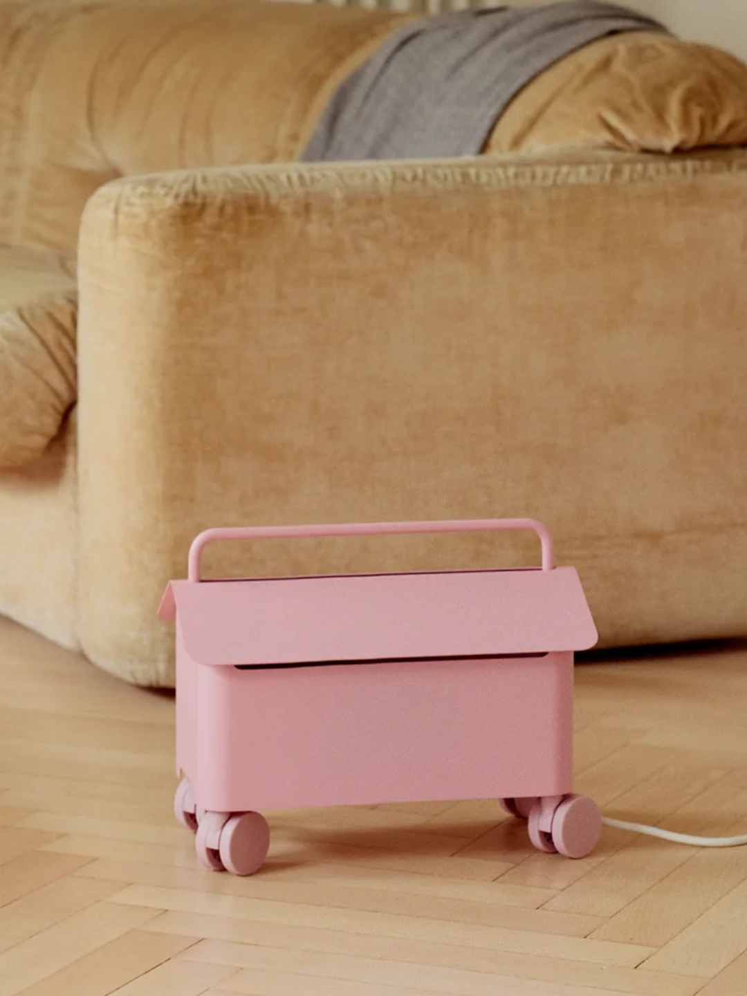 A bubblegum pink cable house on wheels from Pedestal
