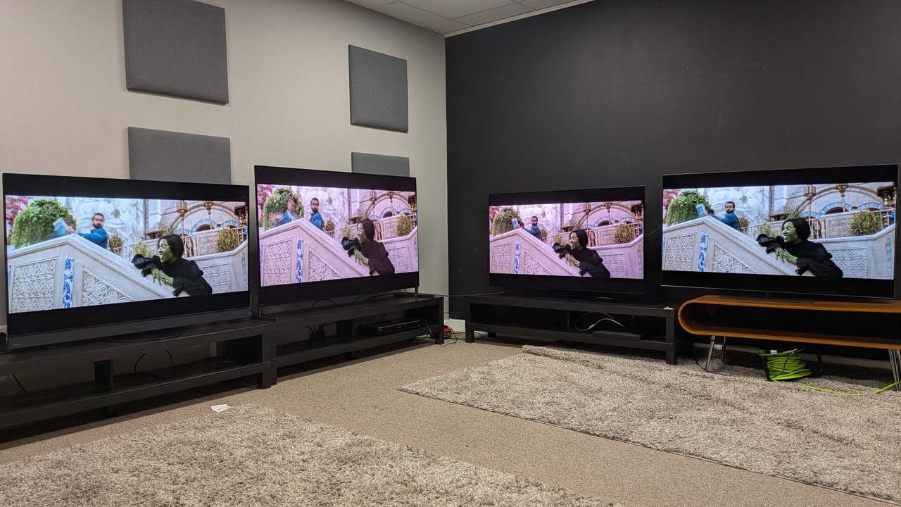 Panasonic Z95B (far left) Sony Bravia 8 II (middle left) Samsung S95F (middle right) LG G5 (far right) with Elphaba on screen from Wicked