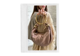 Anna LaPlaca wearing a Chloé Bracelet Hobo Bag.