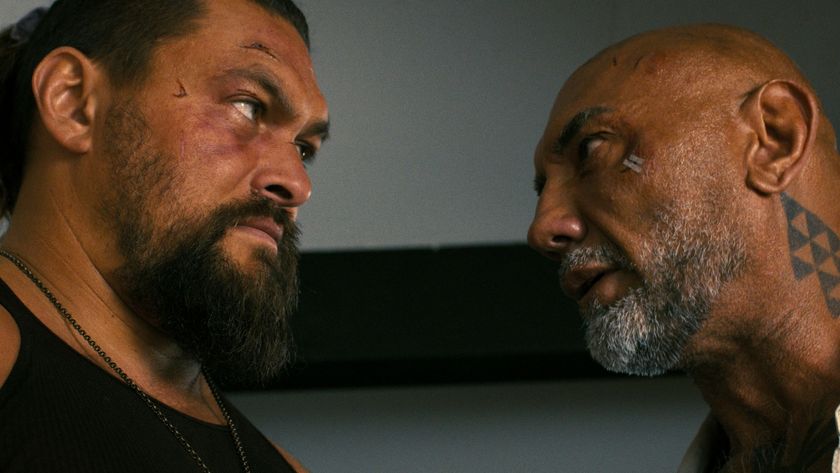 Jason Momoa and Dave Bautista stare at each other