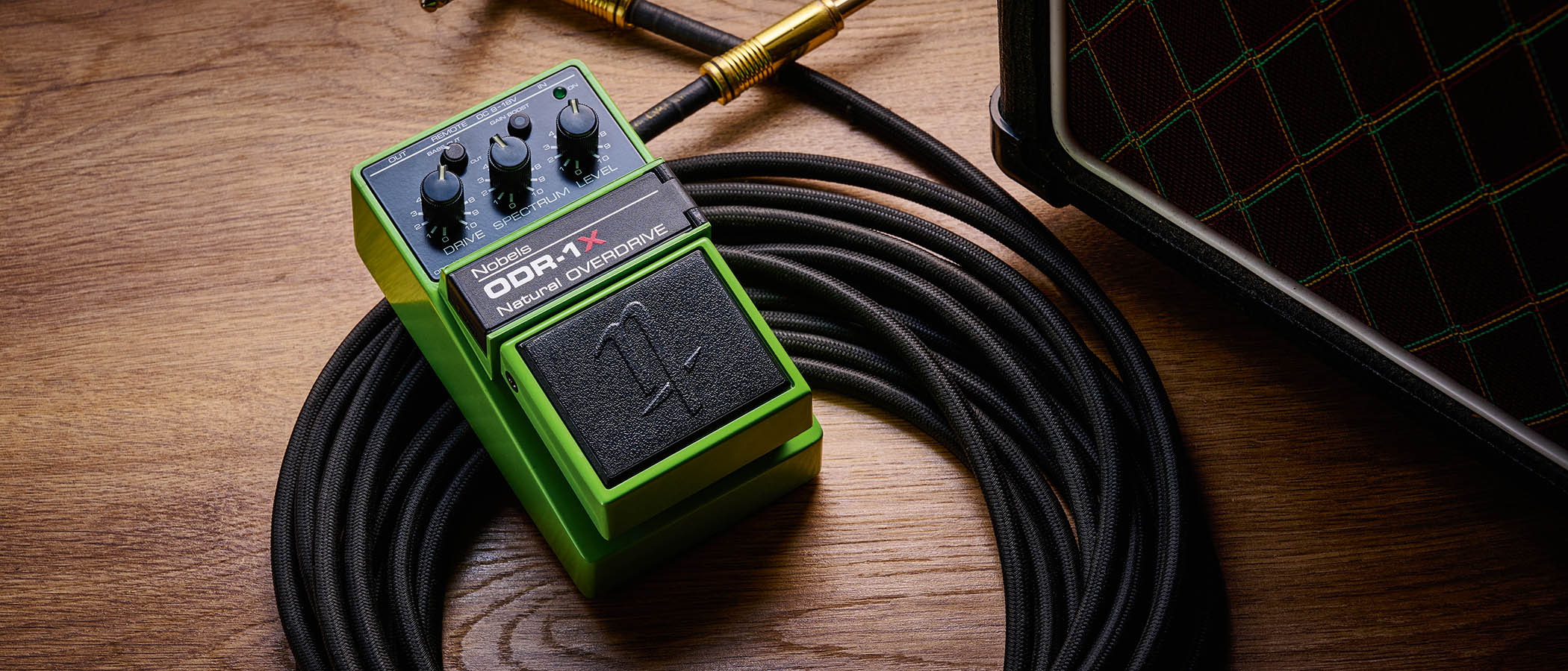 Nobels ODR-1X: the latest iteration of the "other" classic green drive pedal is pictured ontop of a coiled guitar cable.