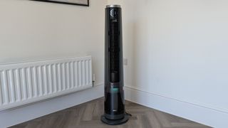 The Dreo Smart Misting Fan 765S in the corner of a room.