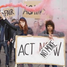 Social group, Interaction, Protest, Youth, Jacket, Banner, Handwriting, Rebellion, Advertising, Social work, 