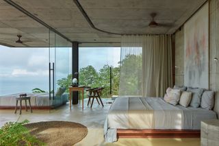Glazed bedroom in Costa Rican villa