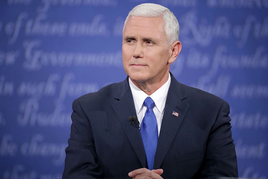 Mike Pence, U.S. vice president, listens during one of the vice presidential debates in October 2016.