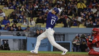 March 25: Shohei Ohtani bats during the Los Angeles Dodgers vs. Los Angeles Angels spring training game at Dodger Stadium on Monday, March 25, 2024 in Los Angeles, CA