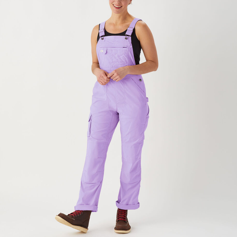 Woman wearing Heirloom Gardening Bib Overalls in Wild Aster