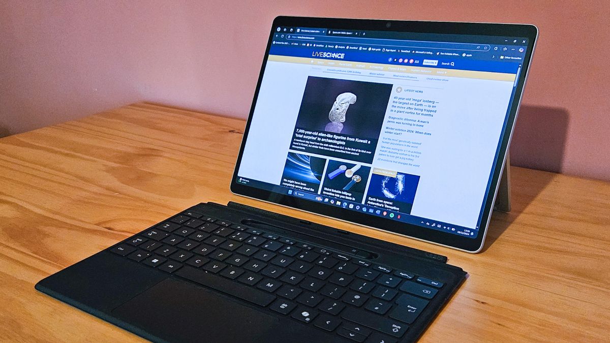 Close-up of the display screen and keyboard of the Microsoft surface pro 11, detached from each other.