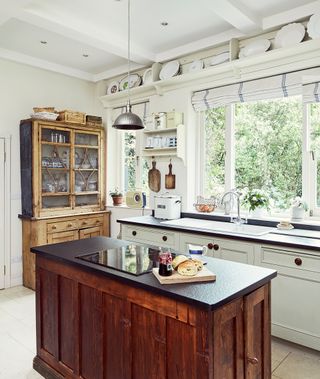 country kitchen with island in converted Irish schoolhouse by the canal