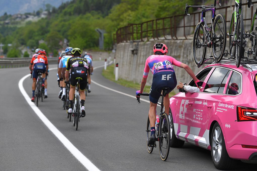 Hugh Carthy gets some advice from the team car during stage 14 at the Giro