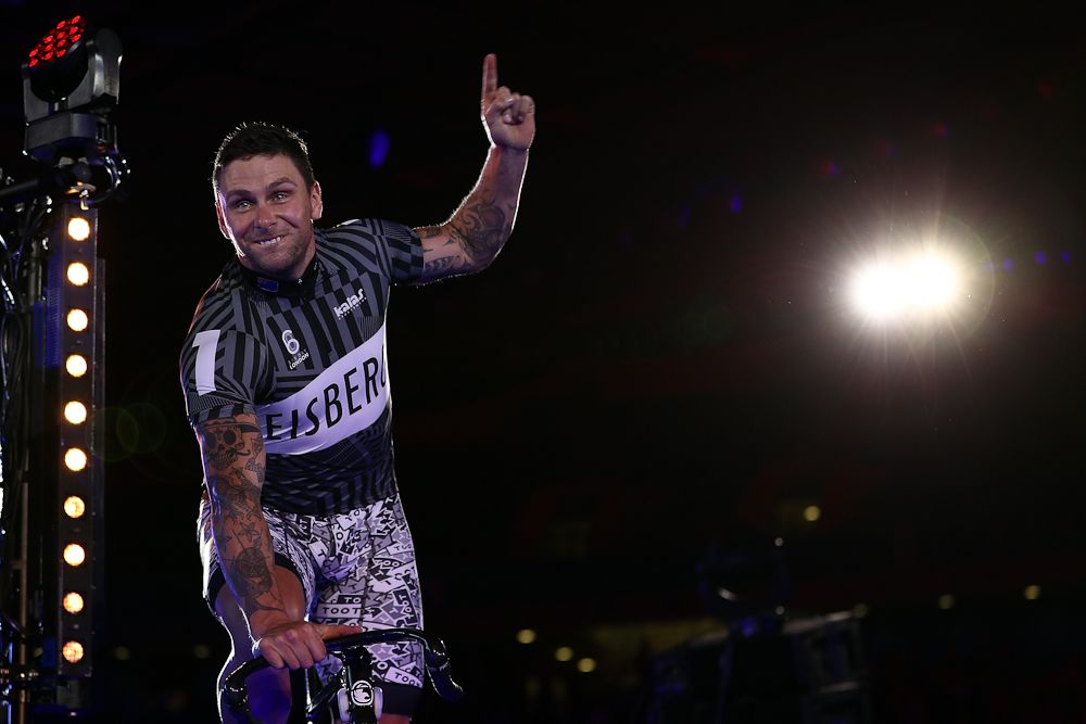 Edward Dawkins of New Zealand waves as he's introduced to the fans on day one of the London Six Day