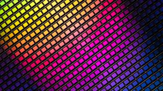 Close-up Shot of CMOS Semiconductor Silicon Wafer/Getty Images