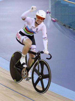A delighted Anna Meares celebrates posting the fastest time