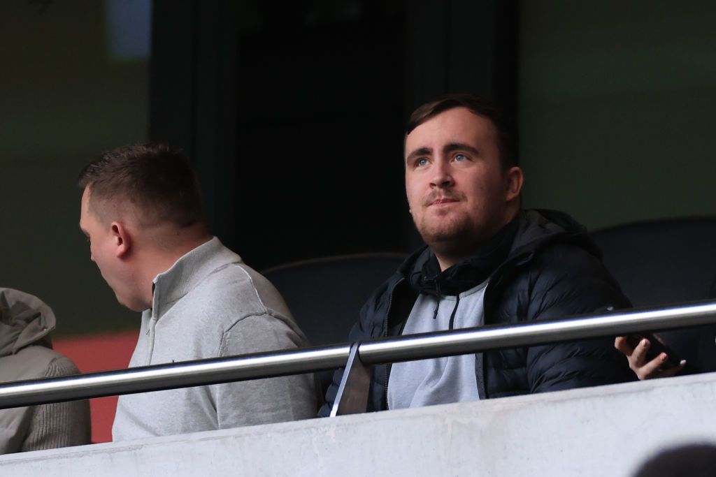 Luke Littler, Darts player (R) in attendance during the Premier League match between Tottenham Hotspur and AFC Bournemouth at Tottenham Hotspur Stadium on December 31, 2023 in London, England. 