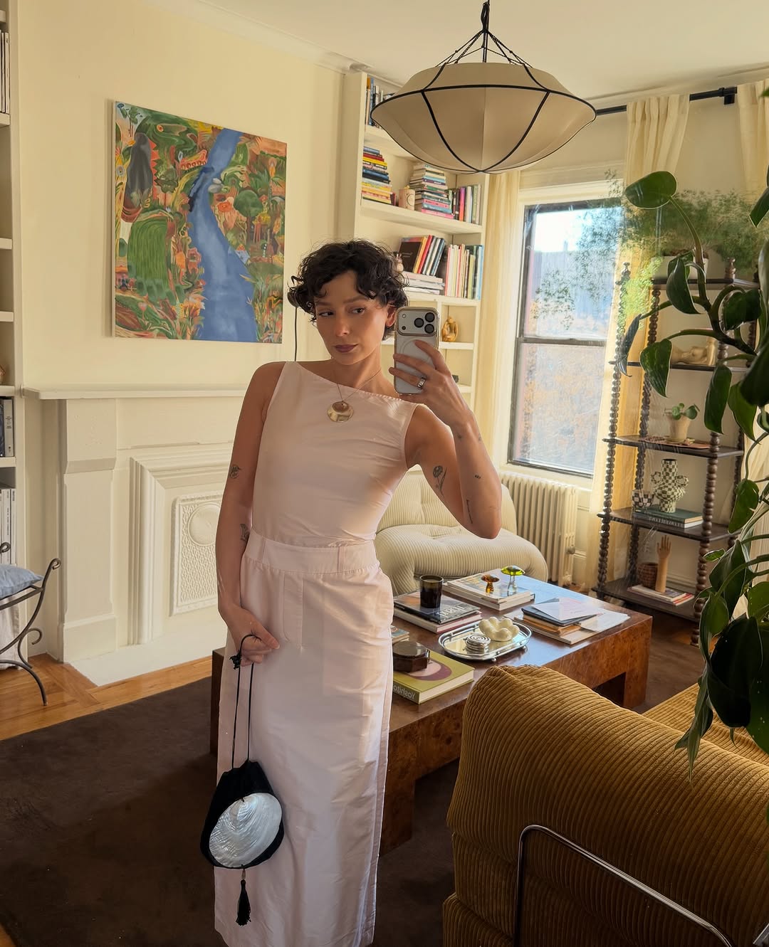 Woman wearing boatneck top.