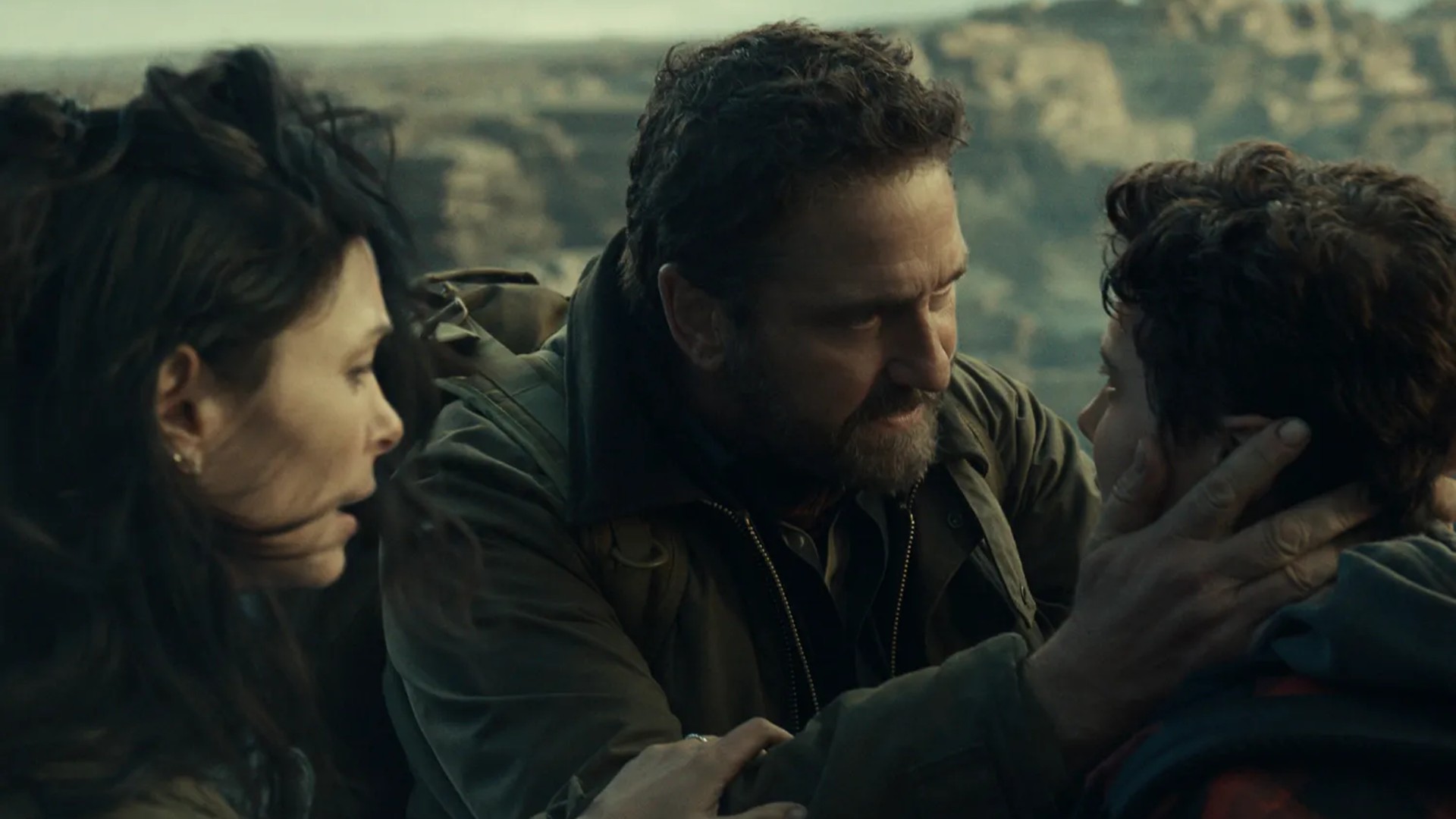 Gerard Butler as John and Morena Baccarin as Allison in Greenland 2: Migration