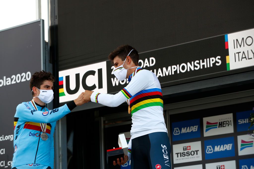 IMOLA ITALY SEPTEMBER 25 Podium Wout Van Aert of Belgium Silver Medal Filippo Ganna of Italy Gold medal World Champion Jersey Celebration Mask Covid Safety Measures Social distancing during the 93rd UCI Road World Championships 2020 Men Elite Individual Time Trial a 317km race from Imola to Imola Autodromo Enzo e Dino Ferrari ITT ImolaEr2020 Imola2020 on September 25 2020 in Imola Italy Photo by Bas CzerwinskiGetty Images