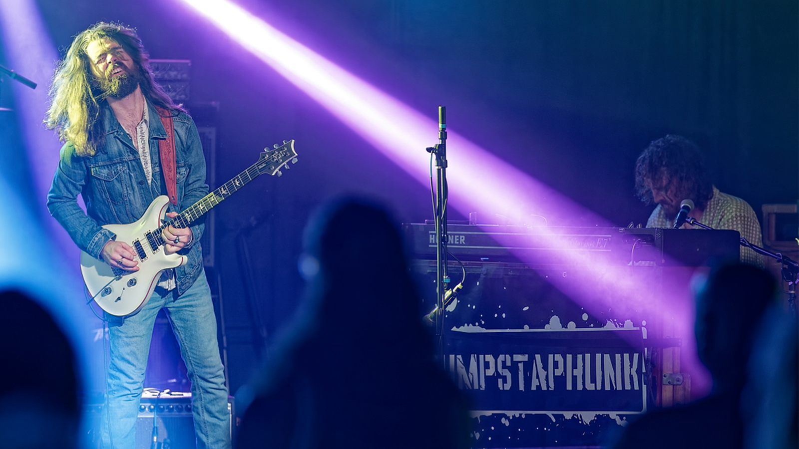 Press photos of Magnolia Boulevard performing live with PRS guitars