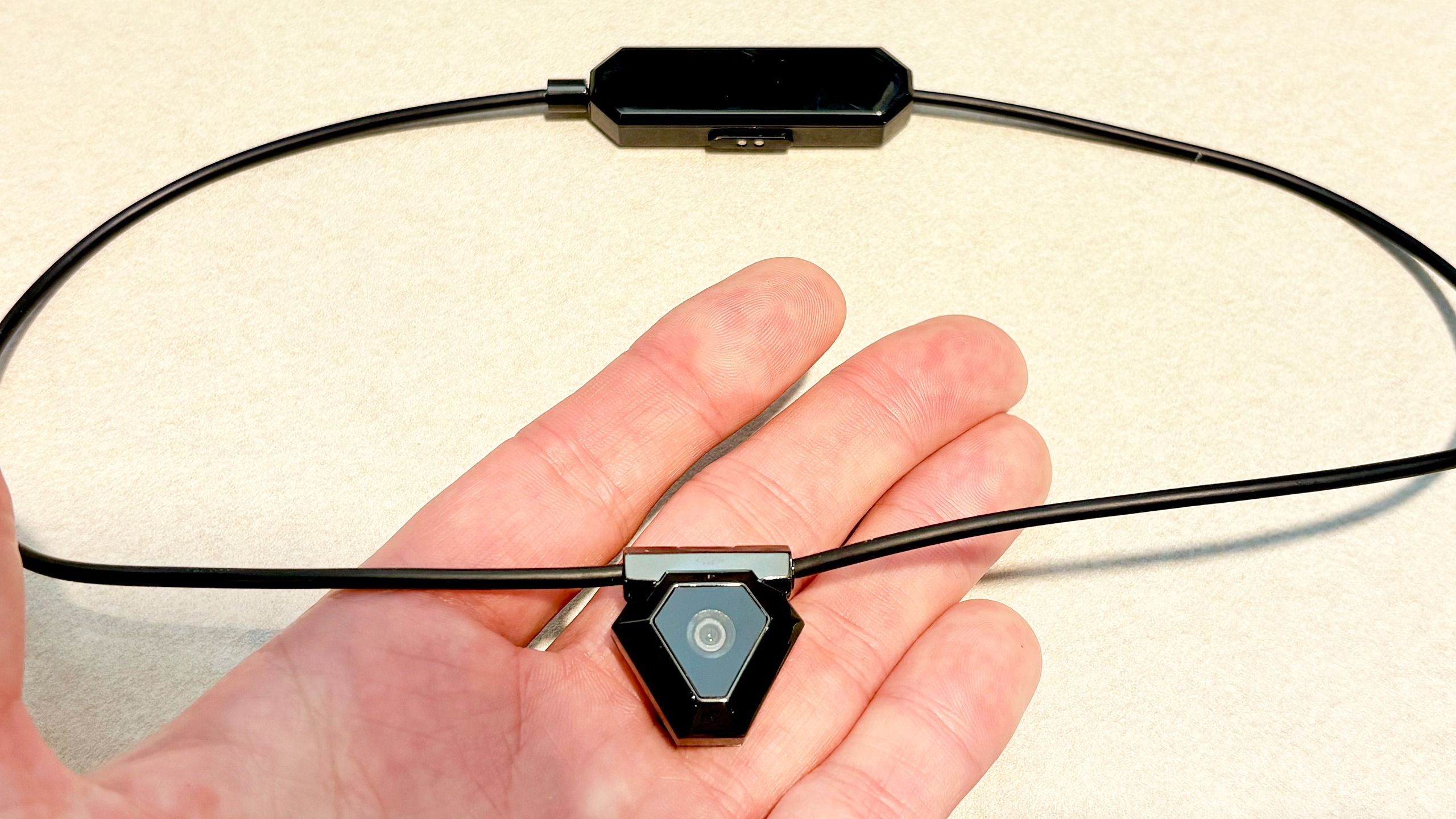 Close-up of the Odyss N1 AI-powered necklace that tracks what you eat