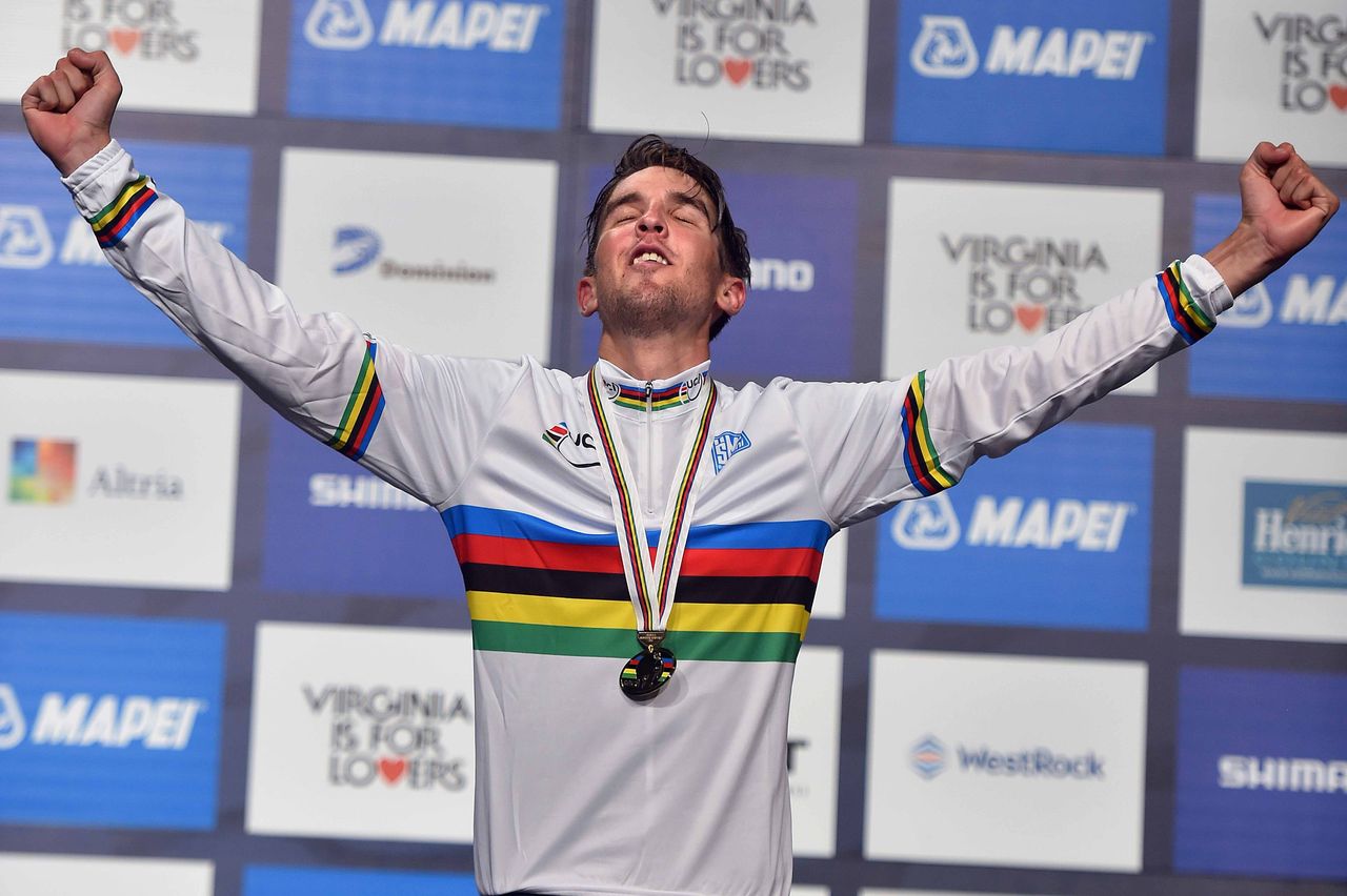 Kevin Ledanois (France) soaking in his rainbow jersey