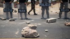 Rocks thrown at police during a peasants protest demanding a higher salary in Ica, Peru.