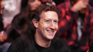 Meta CEO Mark Zuckerberg smiling at a sports event