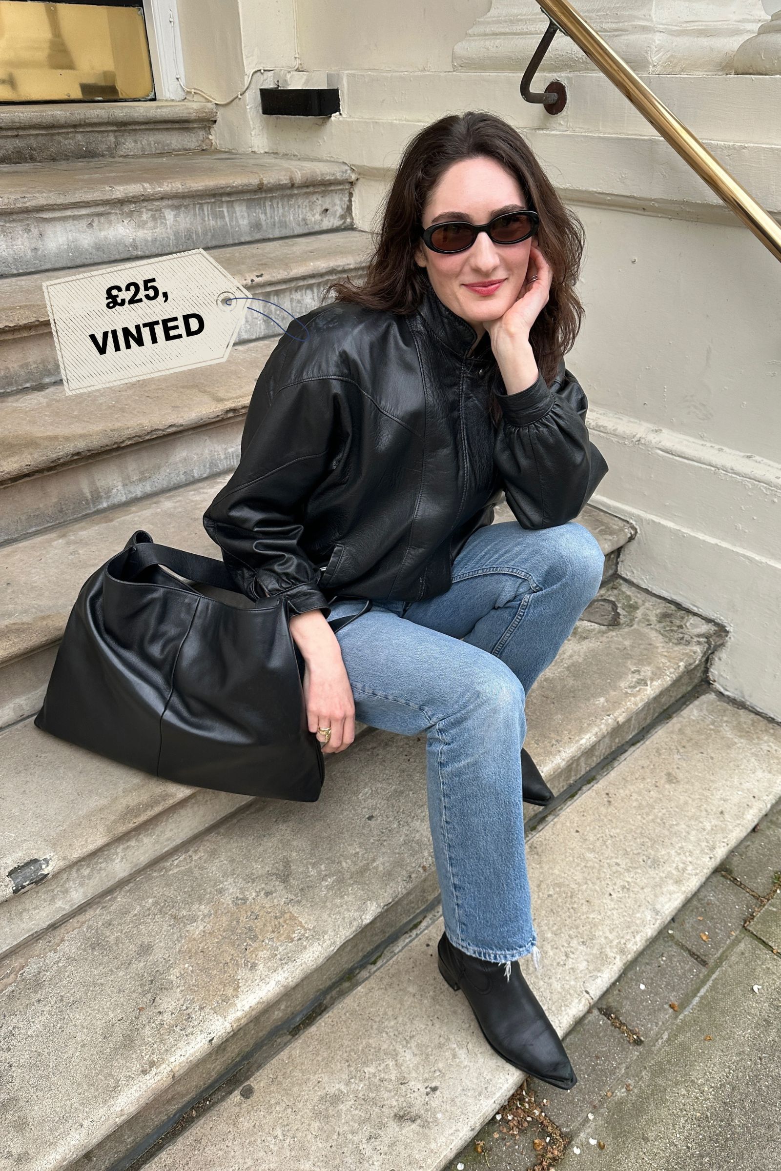 Natalie wears a second hand leather bomber jacket.