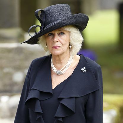 CHATSWORTH, UNITED KINGDOM - OCTOBER 02: (EMBARGOED FOR PUBLICATION IN UK NEWSPAPERS UNTIL 48 HOURS AFTER CREATE DATE AND TIME) Camilla, Duchess of Cornwall attends the funeral of Deborah, Dowager Duchess of Devonshire at St Peter's Church, Edensor on October 2, 2014 in Chatsworth, England. Deborah Cavendish, Dowager Duchess Of Devonshire, the last surviving Mitford sister, died aged 94 on September 24, 2014. Deborah was known as the 'housewife duchess', and her noted business acumen made Chatsworth House one of the most successful and profitable stately homes in England. (Photo by Max Mumby/Indigo/Getty Images)