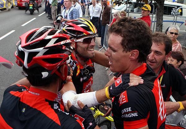 The team congratulate their stage winner.