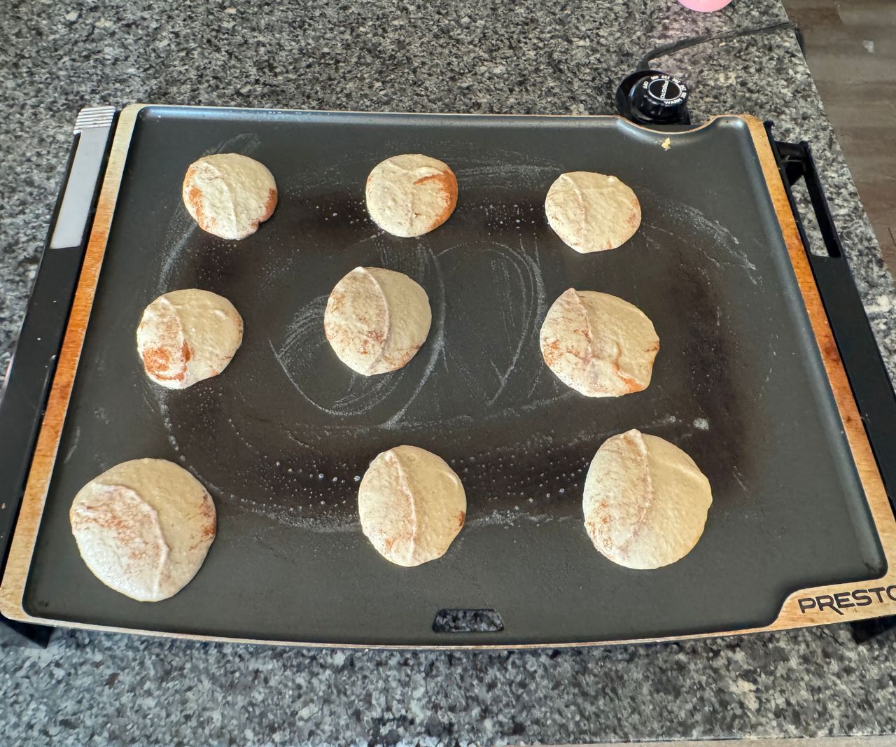 Pancake better cooking on a plug-in electric stovetop.