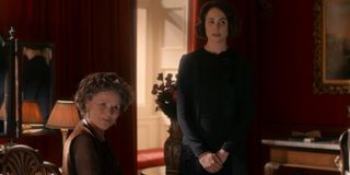 Downton Abbey Imelda Staunton and Tuppence Middleton sitting in one of the manor's rooms