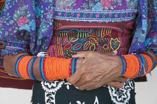 A traditional Kana Yala woman's traditional dress, Panama.