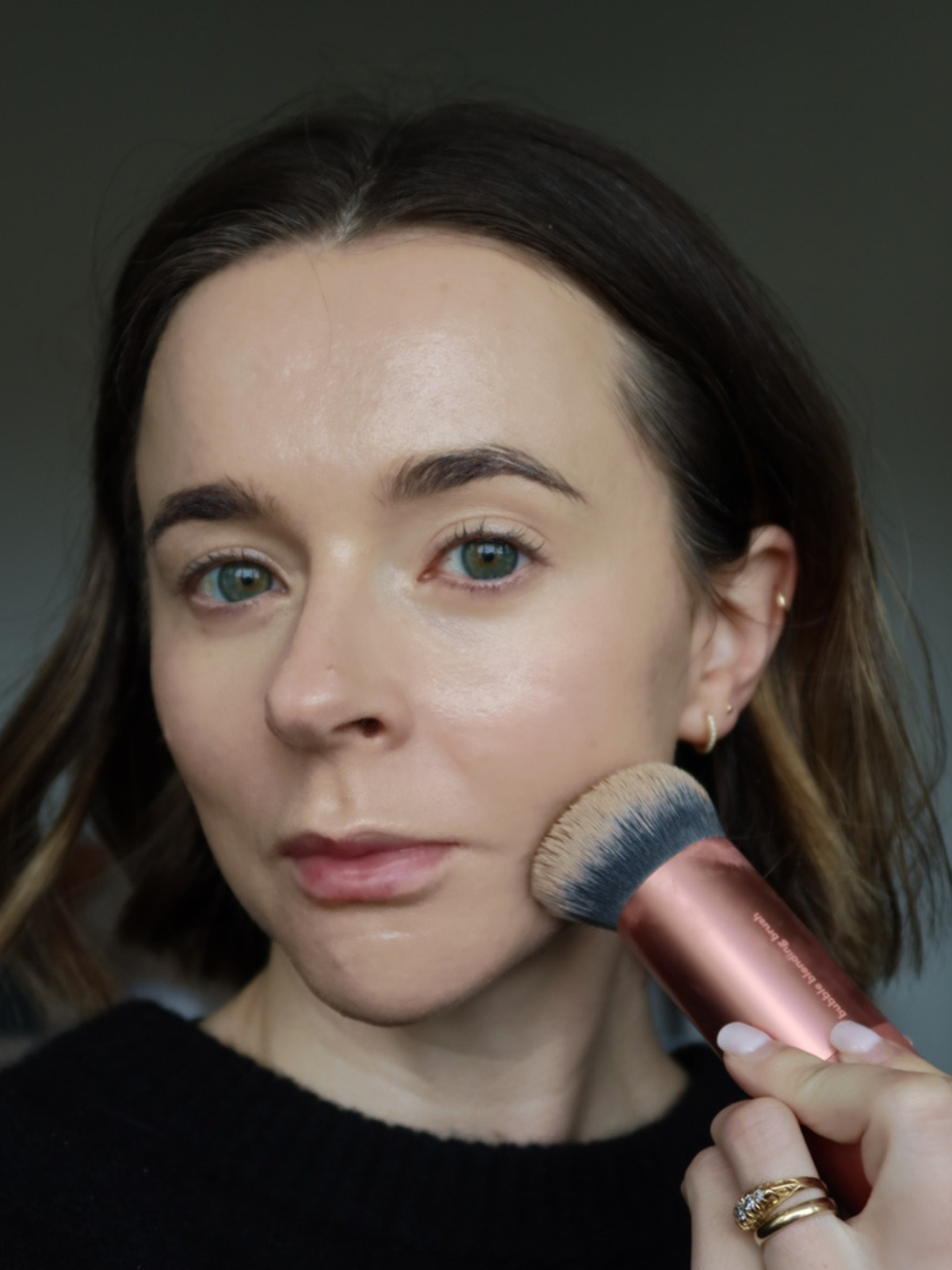 Freelance beauty editor Grace Day, wearing Saie Sun Melt Natural Cream Bronzer