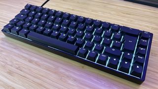 Endgame Gear KB65HE keyboard on a wooden desk