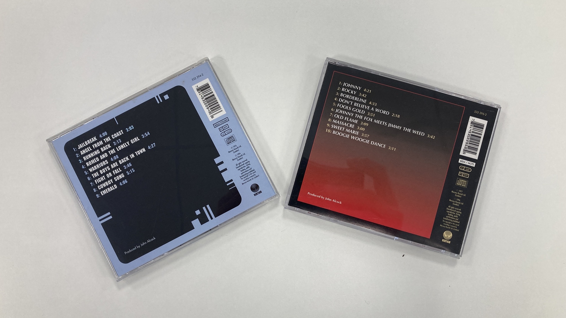 Thin Lizzy's Jailbreak and Johnny the Fox CD cases rear covers